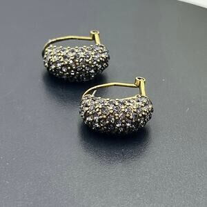 Heidi Daus "Hugs from Heidi" Crystal Half-Hoop Earrings in a violet crystal pavé